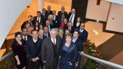 Miembros del PSCG y directivos de la Organización Mundial de Aduanas en la sede de la OMA en Bruselas.